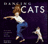 Dancing with cats.gif (1383 bytes)